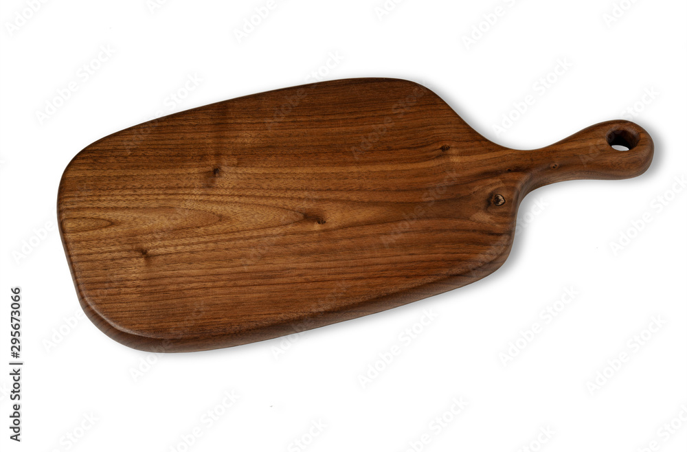 Walnut handmade wood cutting board on the linen Walnut handmade wood cutting board on the linen