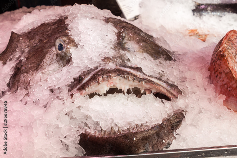 Obraz premium Fish at a stall in Mercado de San Miguel market in Madrid, Spain
