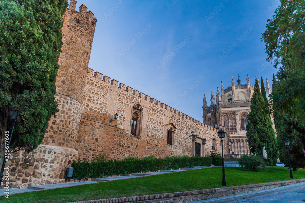Palacio de la Cava palace (left) and San Juan de los Reyes monastery in Toledo, Spain
