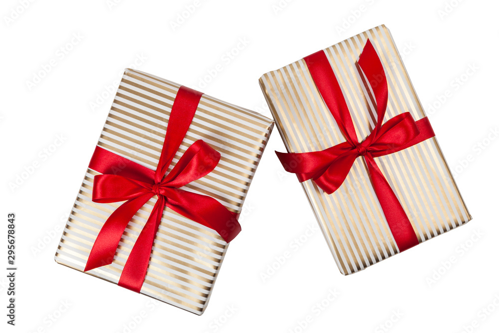 Obraz premium Weihnachtsgeschenk mit goldenen Streifen und roter Schleife als Freisteller (Draufsicht)