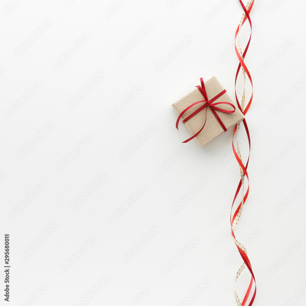 Fototapeta premium Christmas composition. Gift ribbon top view background with copy space for your text. Flat lay.
