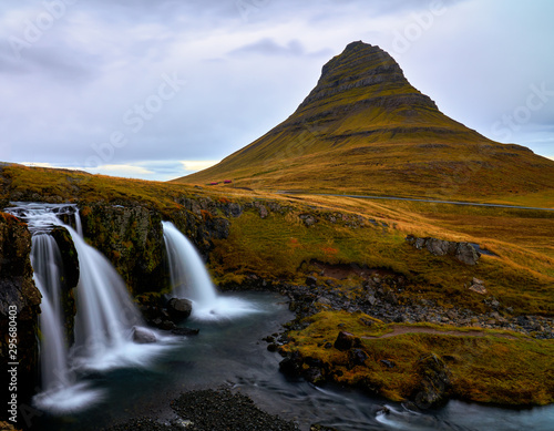 Kirkjufell (Church Mountain) mountain in Autumn colours in Snaefellsnes peninsula, Iceland on overcast early October afternoon in 2019. photo