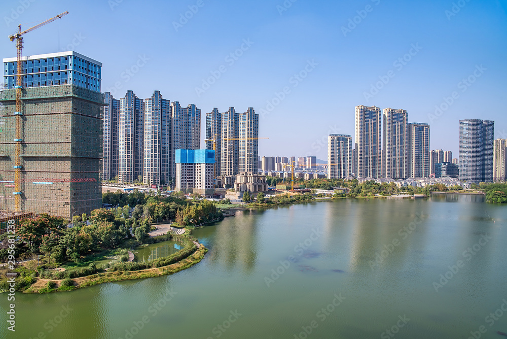 Fototapeta premium Meixi Lake City Island Viewing Platform and Construction of Intensive Real Estate in Changsha City, Hunan Province, China