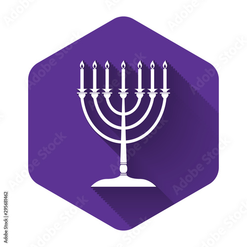 White Hanukkah menorah icon isolated with long shadow. Religion icon. Hanukkah traditional symbol. Holiday religion, jewish festival of Lights. Purple hexagon button. Vector Illustration