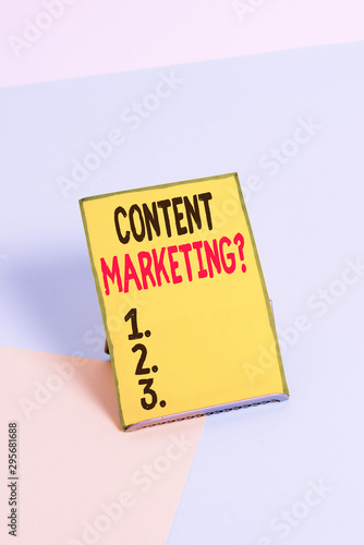 Word writing text Content Marketing Question. Business photo showcasing involves creation and sharing of online material Paper placed tilted above buffer wire on soft pastel multi colours backdrop