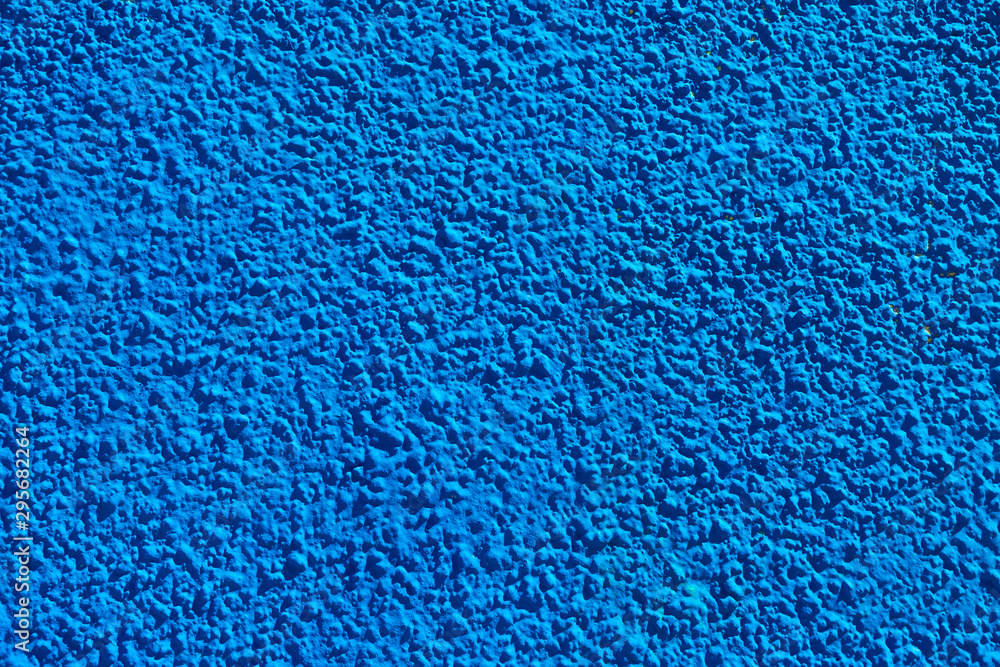Blue bumpy concrete wall texture Blue bumpy concrete wall texture