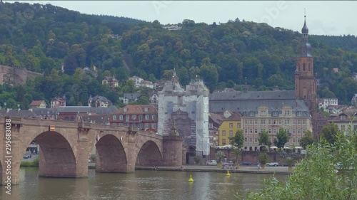 A picturesque of Karl-Theodor Bridge in Heidelberg is a sandstone pedestrian bridge that goes across the Neckar River linking the old town on one side with the Neuenheim district on the other.Germany photo