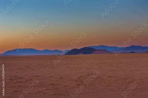 Blue mountains after sunset in the desert