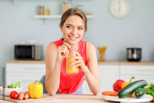 Young woman drinking health...