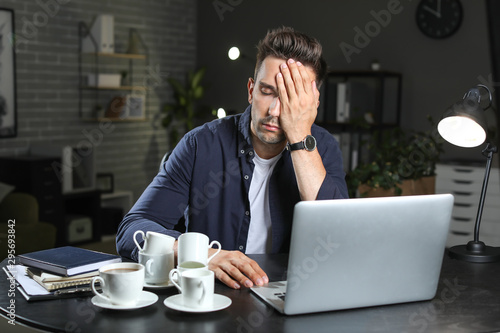Tired man trying to meet de...