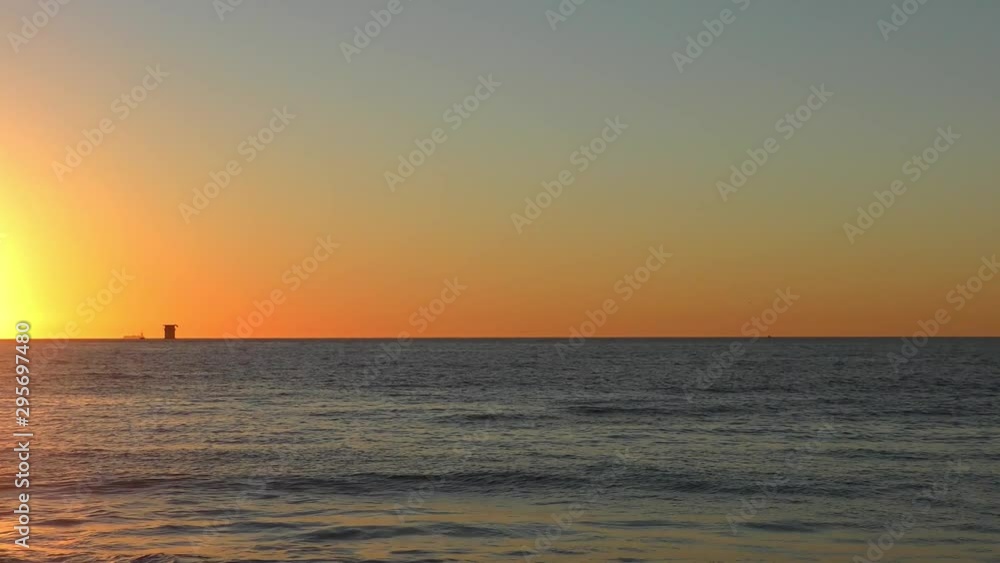 Sunset over the Pacific Ocean as seen from Baker Beach in San Francisco, California, USA Sunset over the Pacific Ocean as seen from Baker Beach in San Francisco, California, USA