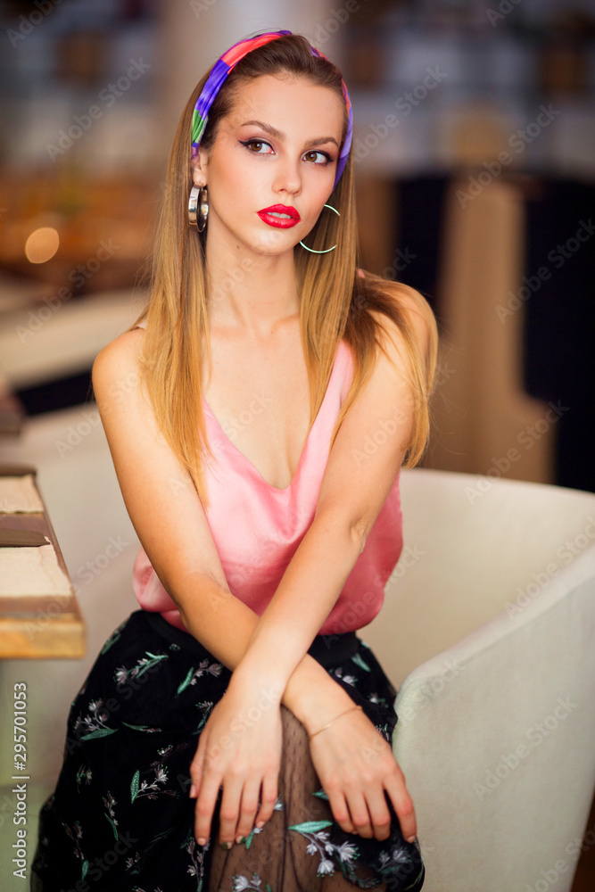 beautiful young woman with make-up indoors beautiful young woman with make-up indoors