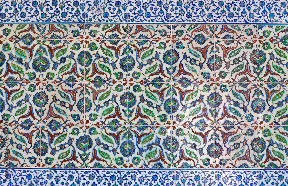Ancient Iznik lapis tiles with paisley floral pattern close up background Ancient Iznik lapis tiles with paisley floral pattern close up background