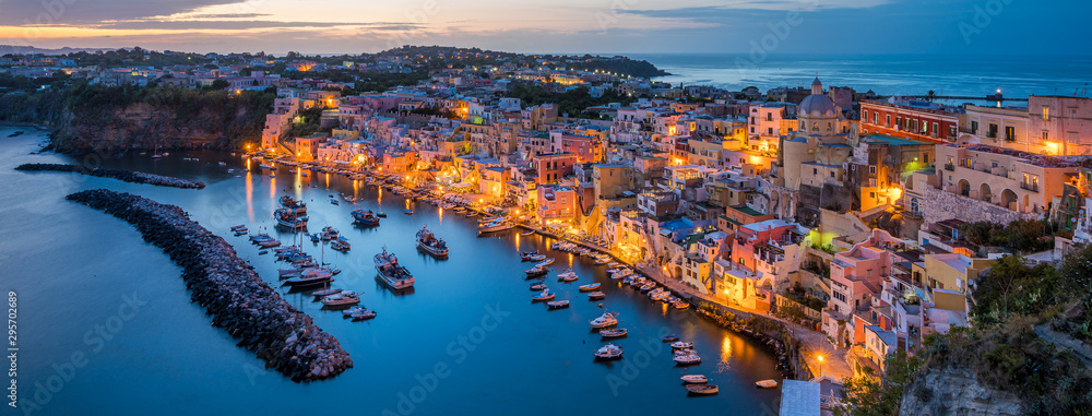 Panoramic sight of the beautiful island of Procida in the evening, near Napoli, Campania region, Italy.