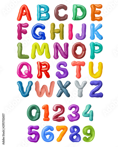 Curved letters of latin alphabet made of colored plasticine  isolated on white background