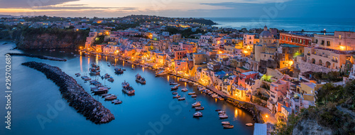 Panoramic sight of the beautiful island of Procida in the evening, near Napoli, Campania region, Italy. photo