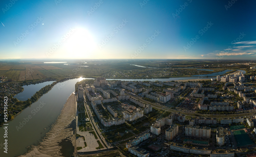 half an hour before sunset over the shallowed Kuban river at the western edge of the city of Krasnodar on an autumn evening in mid-October