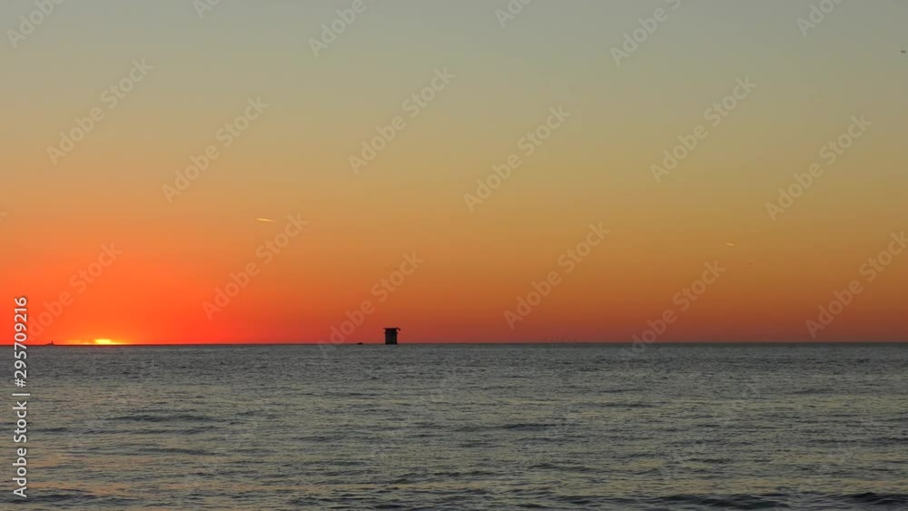 Sunset over the Pacific Ocean as seen from Baker Beach in San Francisco, California, USA. Sunset over the Pacific Ocean as seen from Baker Beach in San Francisco, California, USA.
