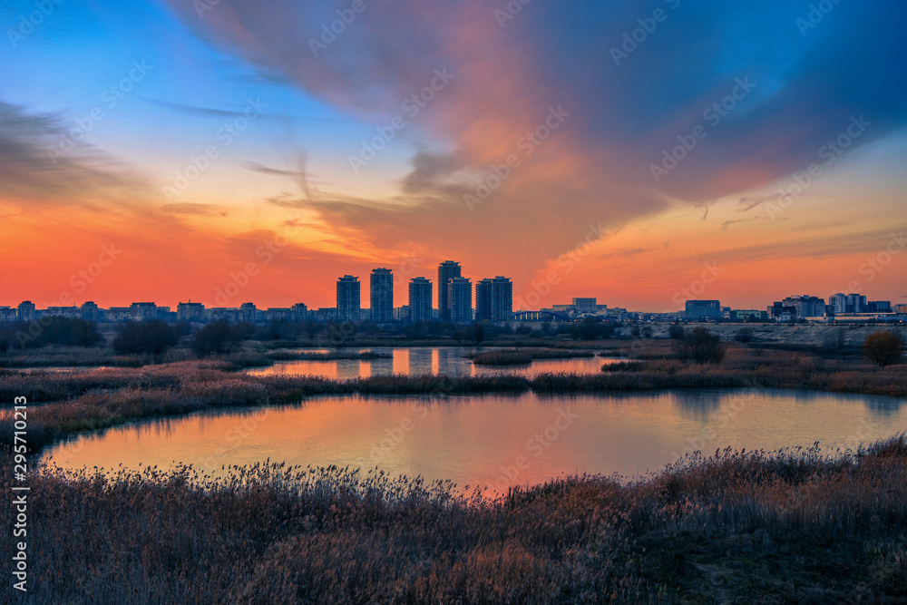 Spectacular sunset beautiful landscape cityscape horizon Bucharest Romania Delta Vacaresti 