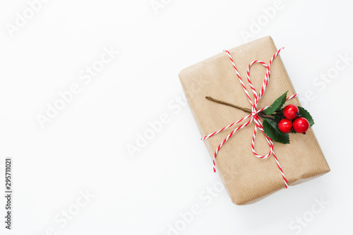 Top view gift box wraped in craft paper, isolated white background mockup copy space