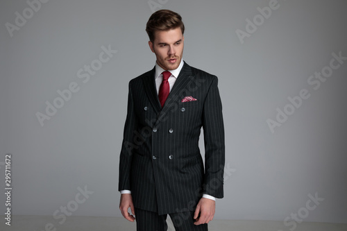 young fashion model wearing double breasted suit