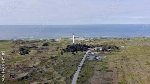 A Lighthouse on the Dunes of Northern Denmark at Lyngvig Fyr photo