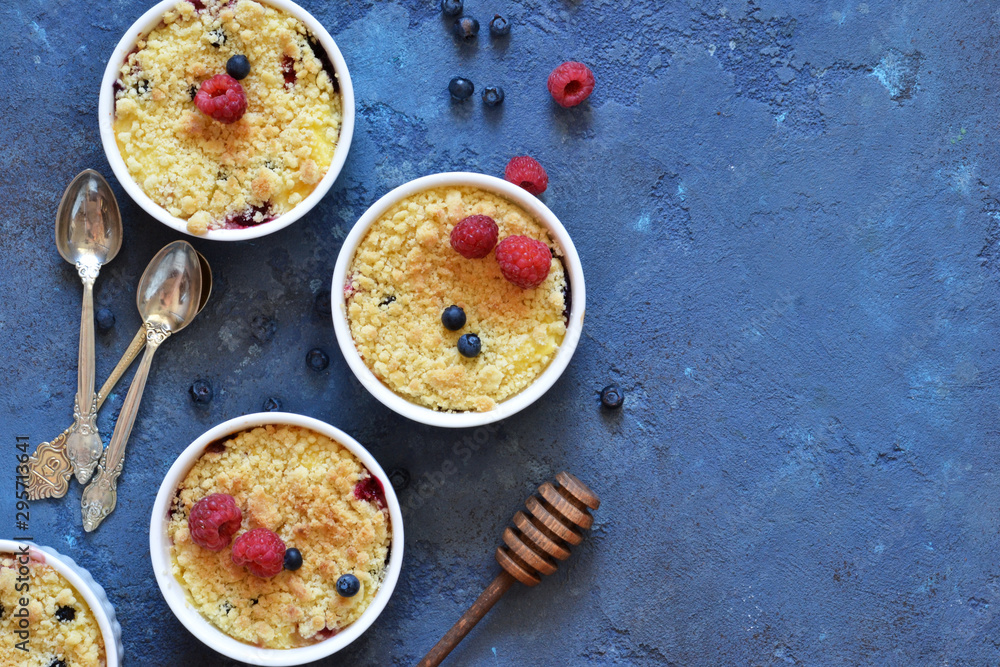 Crumble with berries, honey and almonds. View from above. Crumble with berries, honey and almonds. View from above.