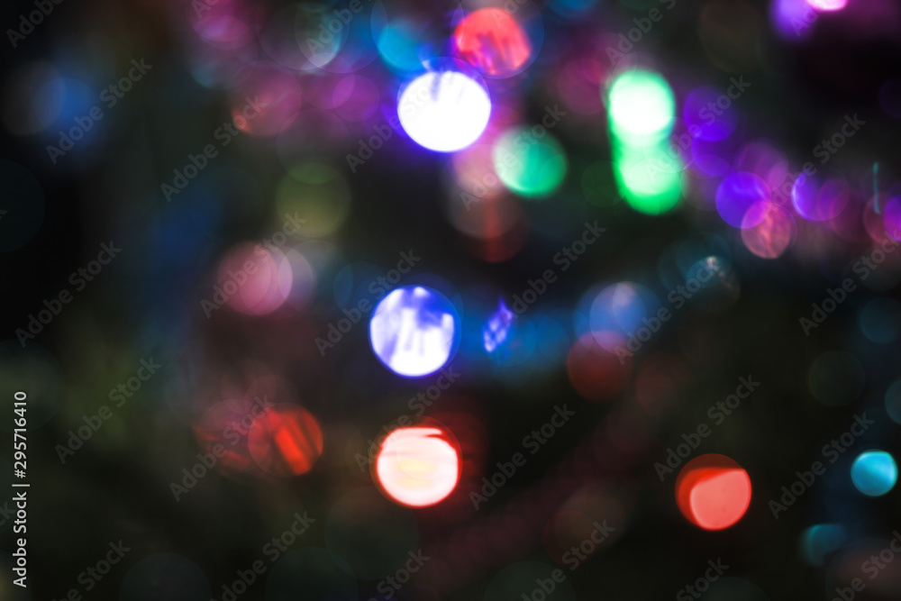 Beautiful Christmas background with garlands and bokeh. New year multi-colored picture. Abstract photo image for design Beautiful Christmas background with garlands and bokeh. New year multi-colored picture. Abstract photo image for design