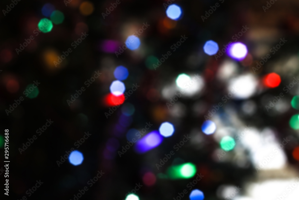 Beautiful Christmas background with garlands and bokeh. New year multi-colored picture. Abstract photo image for design Beautiful Christmas background with garlands and bokeh. New year multi-colored picture. Abstract photo image for design