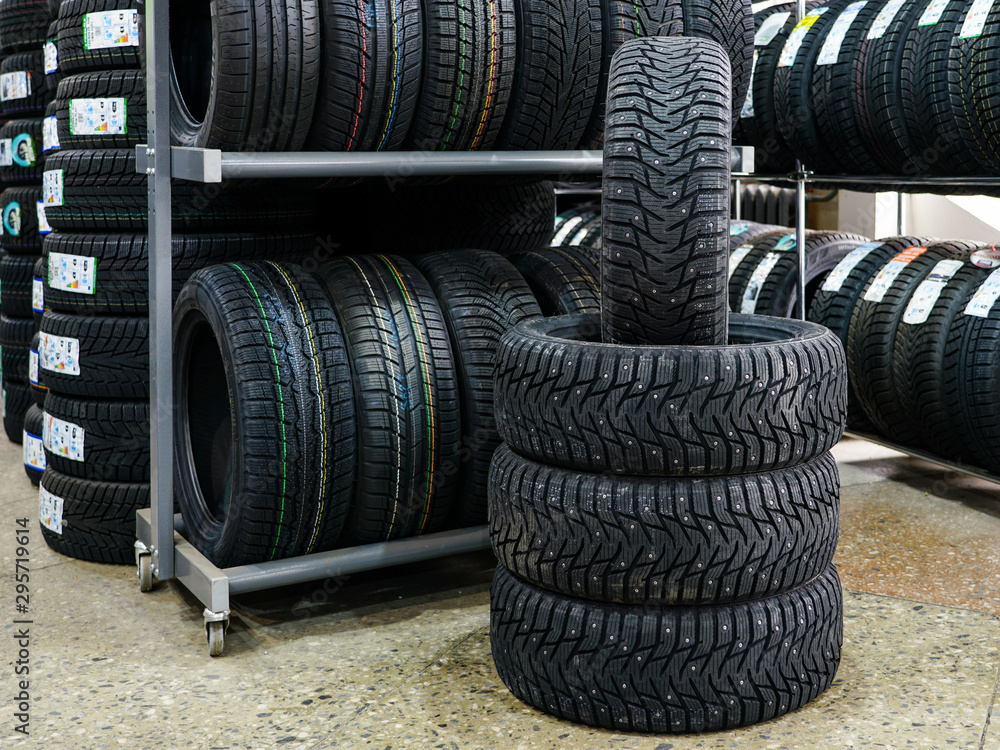 new winter tire set with studs at tire shop new winter tire set with studs at tire shop