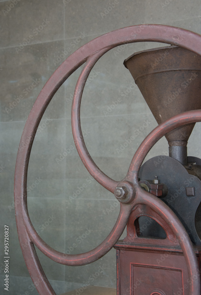 Old coffee grinder to grind the grain