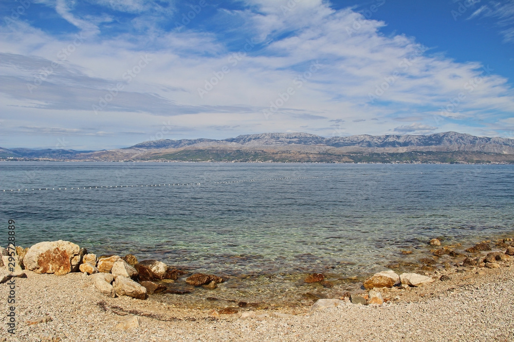 Beautiful landscape of sea Coast of Adriatic sea with Transparent Blue Water near Supetar, Croatia. Popular travel destinations.