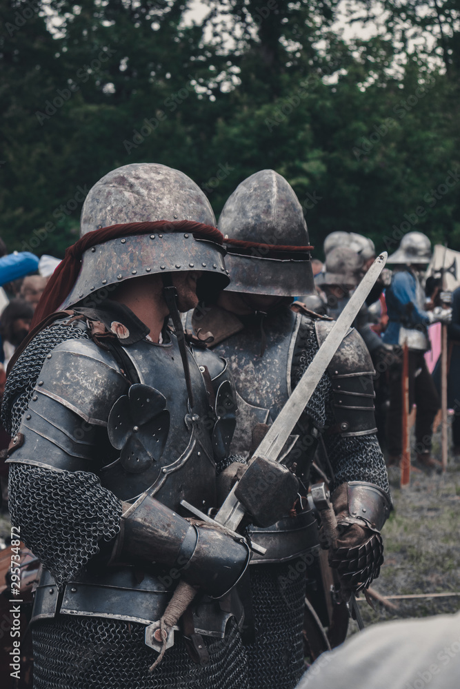 Knights in armor with swords Knights in armor with swords