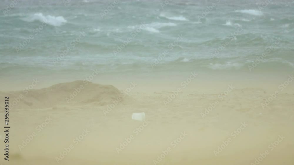A large sandstorm formed drifting, powdered dust during hurriccane storm and strong wind blowing A large sandstorm formed drifting, powdered dust during hurriccane storm and strong wind blowing