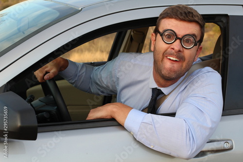 Obnoxious driver with very thick eyeglasses 