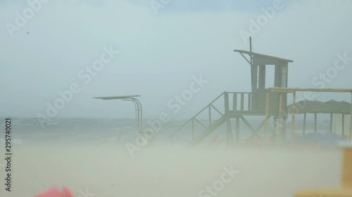 Sandstorm on California Beach, hurricane storm weather with safeguard house photo