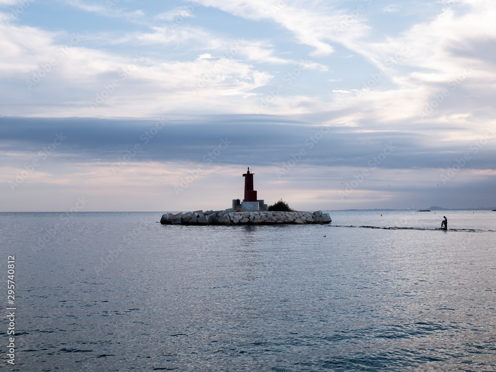  lighthouse in breakwater in the middle of the sea