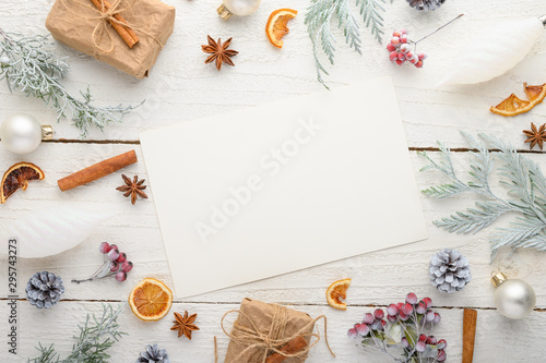 frame, Christmas, New Year. Background with composition, with empty postcard space for design. On a white wooden background.