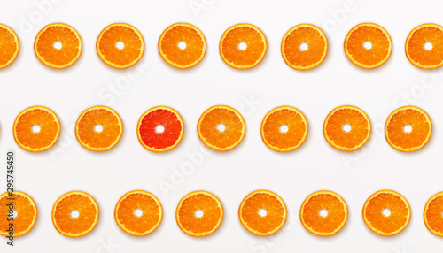 Pattern half cut with orange fruits and grapefruit on white background