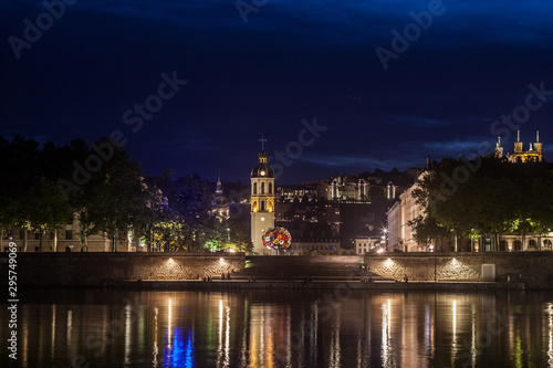 Panorama of Presqu ile district in Lyon at Night with Basilique de Fourviere Church and Clocher de la Charite Clocktower. It is the remaining of a former hospital and a major landmark of Lyon  France