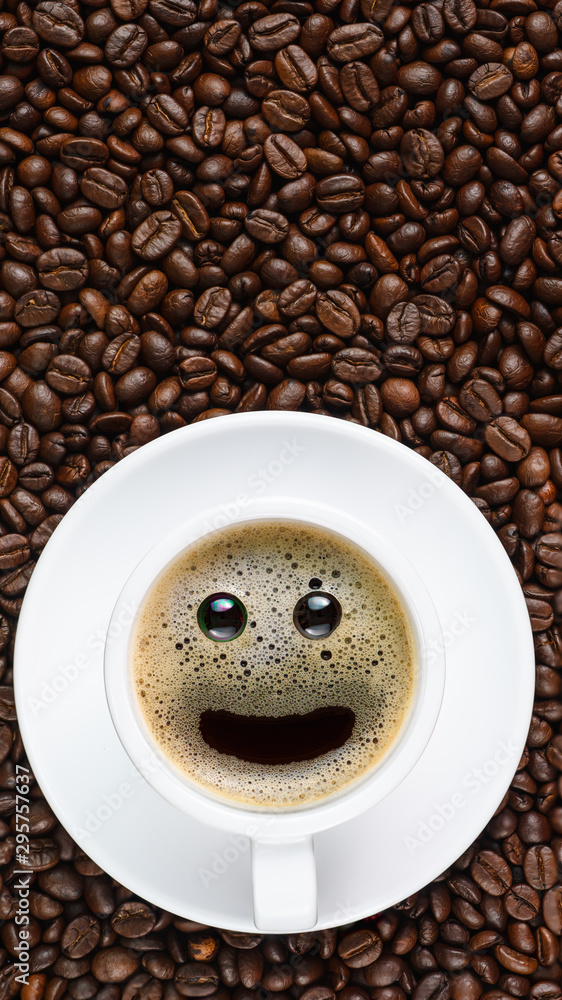 panoramic coffee background of a cup of black coffee with smiling face coffee bubble on background of roasted arabica coffee beans