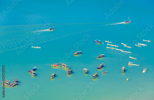 Fishing boats on the blue coast of The North Sea City of Guangxi © Weiming