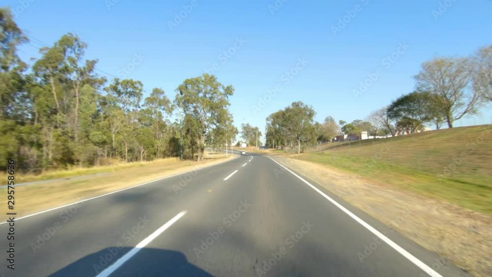 Rear facing driving point of view POV of quiet Australian country roads - ideal for interior car scene green screen replacement Rear facing driving point of view POV of quiet Australian country roads - ideal for interior car scene green screen replacement