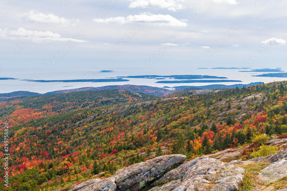 Fall foliage and distant islands as seen from the top of Cadillac Mountain