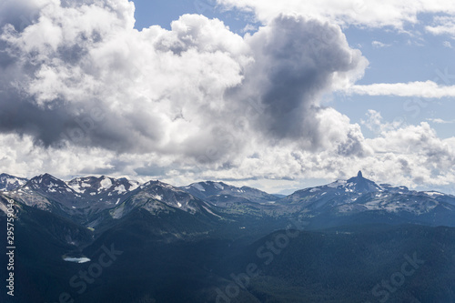 blackcomb mountain peak panorama view cloudy sky summer time. © olegmayorov