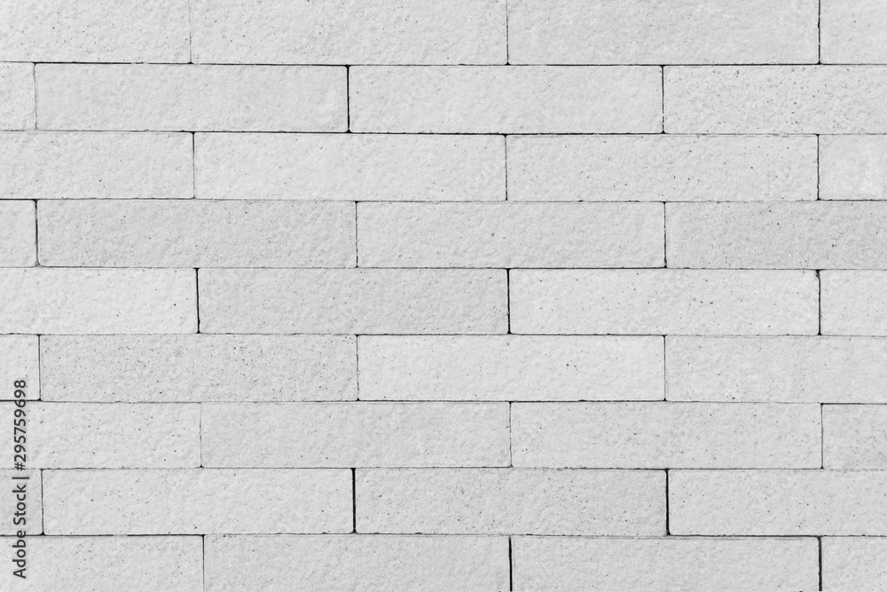 White and light gray brick wall texture for background or wallpaper. White and light gray brick wall texture for background or wallpaper.