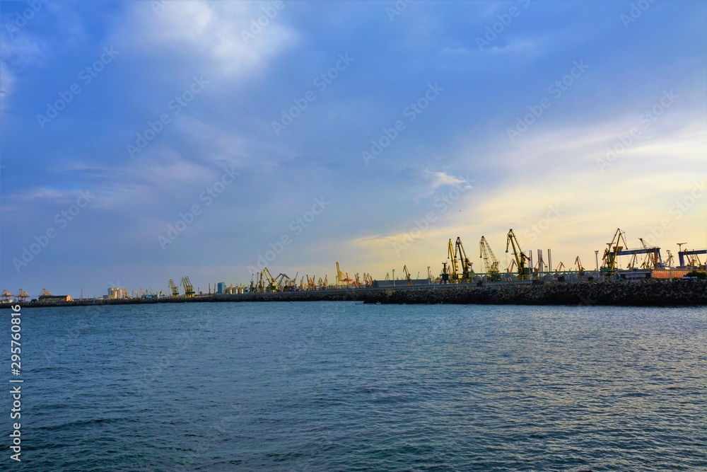 the silhouettes of the cranes from the Constanta seaport