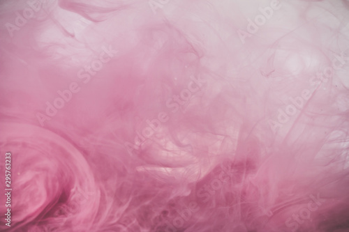 Pink color explosion. Colorful ink in water. Abstract background