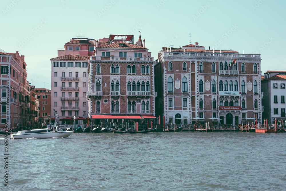 Panoramic view of Grand Canal (Canal Grande) with active traffic boats