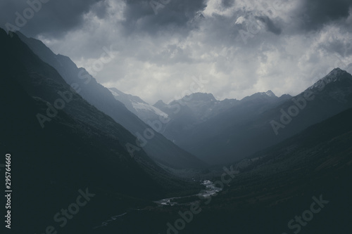 Panorama view on mountains with river scene in national park of Dombay